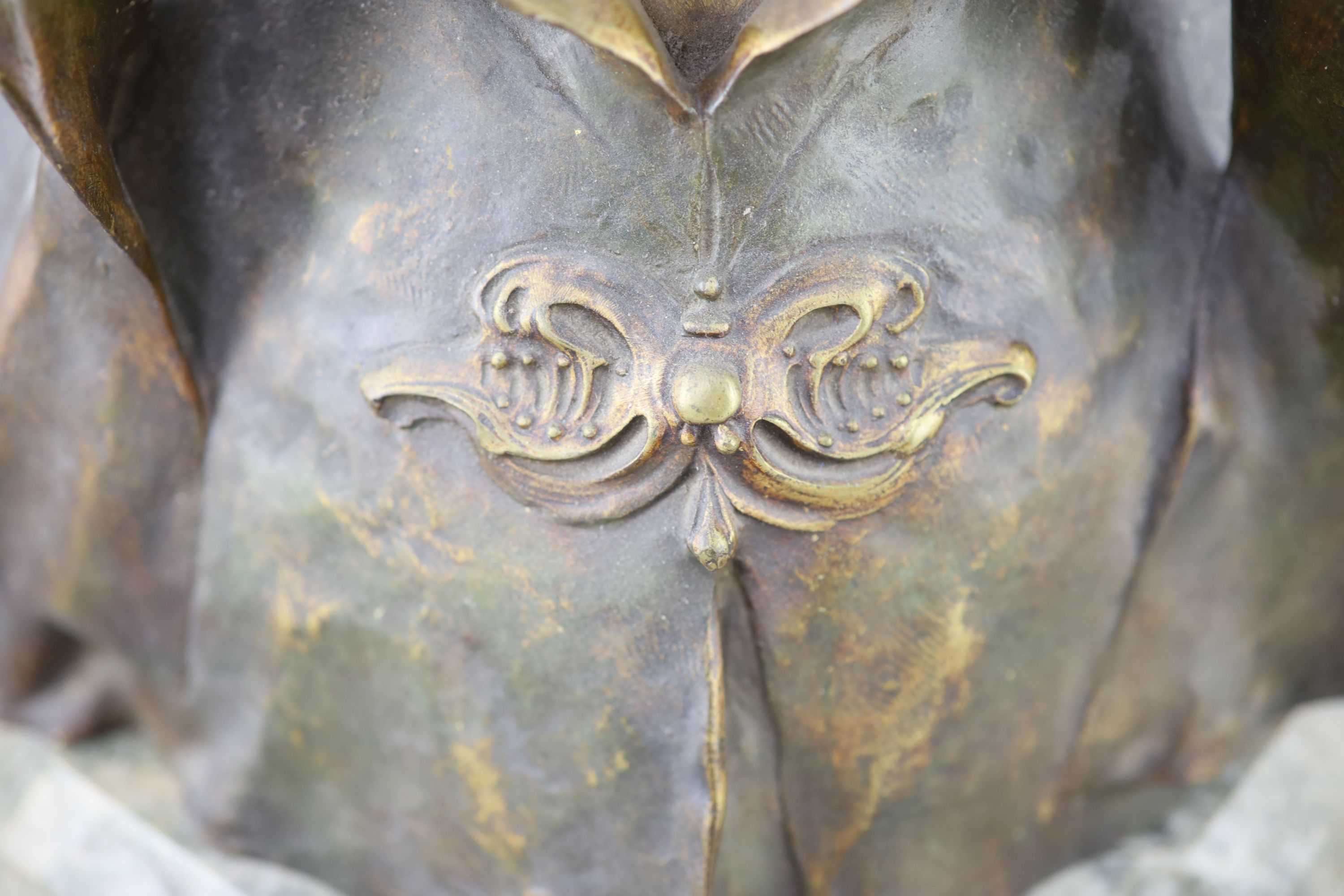 Henry Jacobs. An Art Nouveau gilt bronze bust of a medieval maiden, height 14in., on associated marble plinth